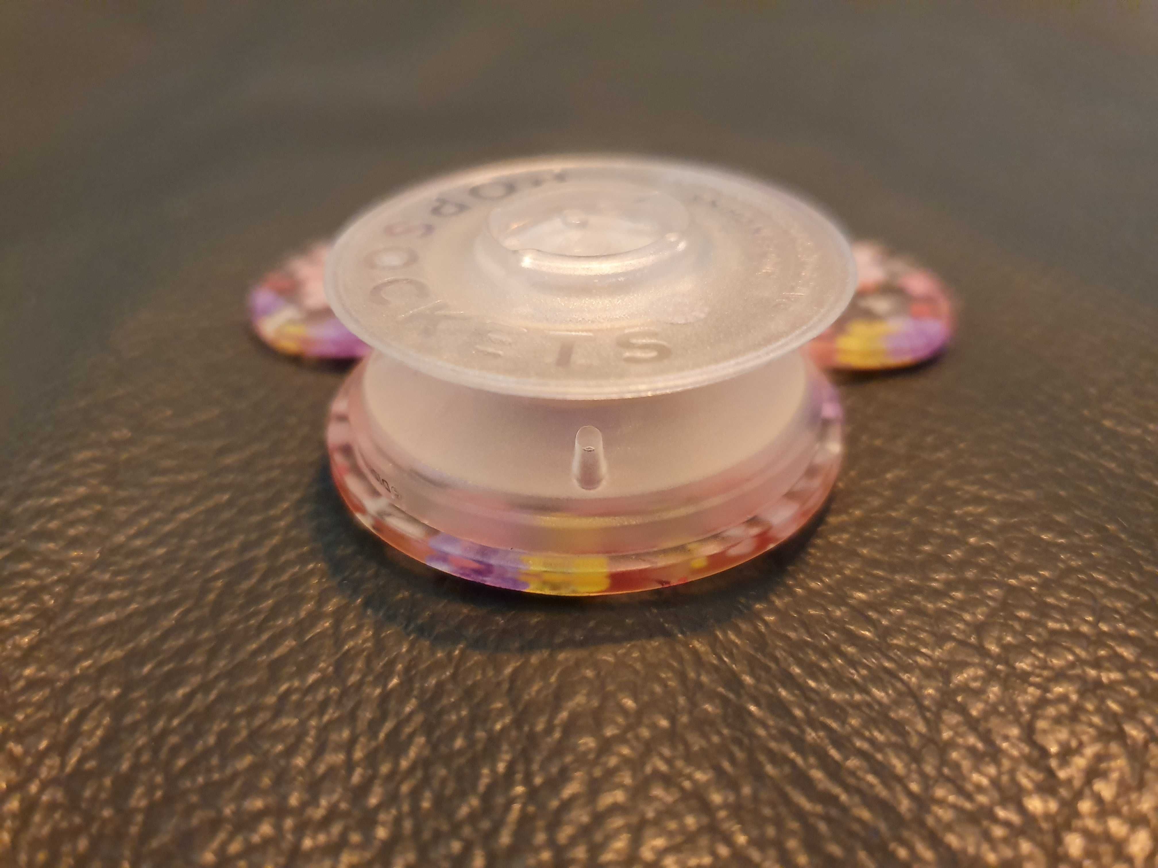 PopSockets: PopGrip - Rozkładany uchwyt i podstawka.