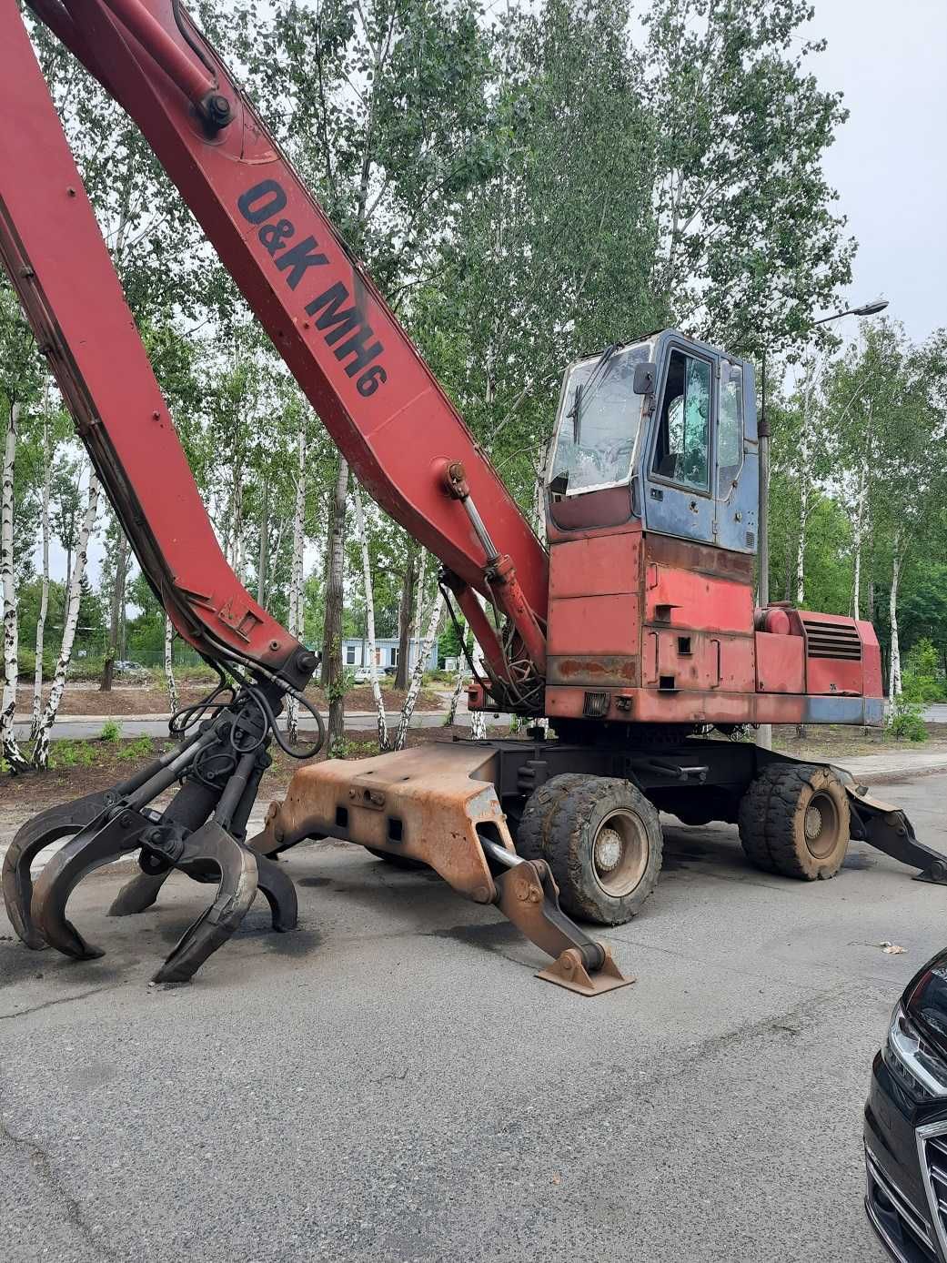 koparka przeładunkowa ładowarka do złomu chwytak z rotatorem O&K mh6