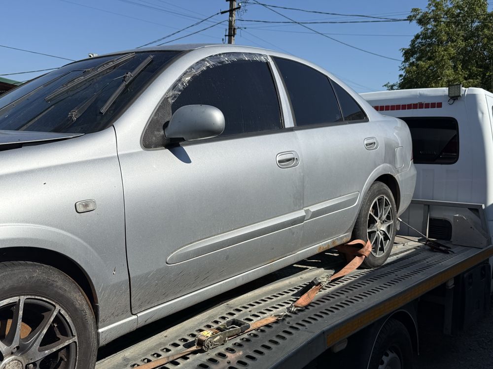 Двери nissan almera classic колір kxc