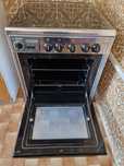 Fogão Tecnogas com 4 bocas a gás natural e butano com forno eletrico