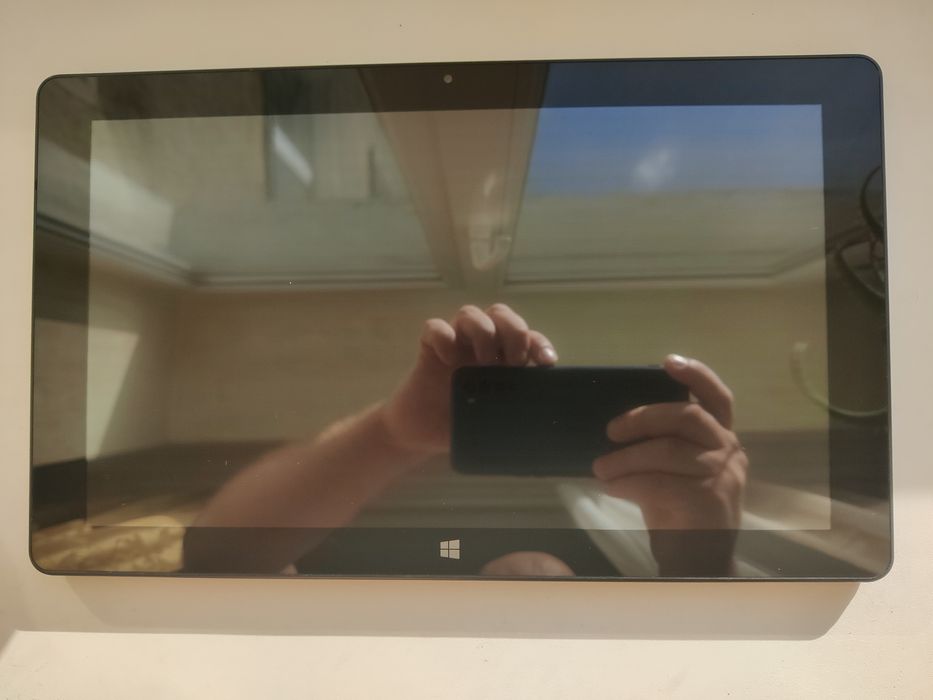 Планшет Trekstor SurfTab twin 11.6 2/32 Гб
