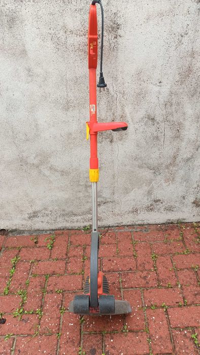 Aparador corta  relva marca outils wolf