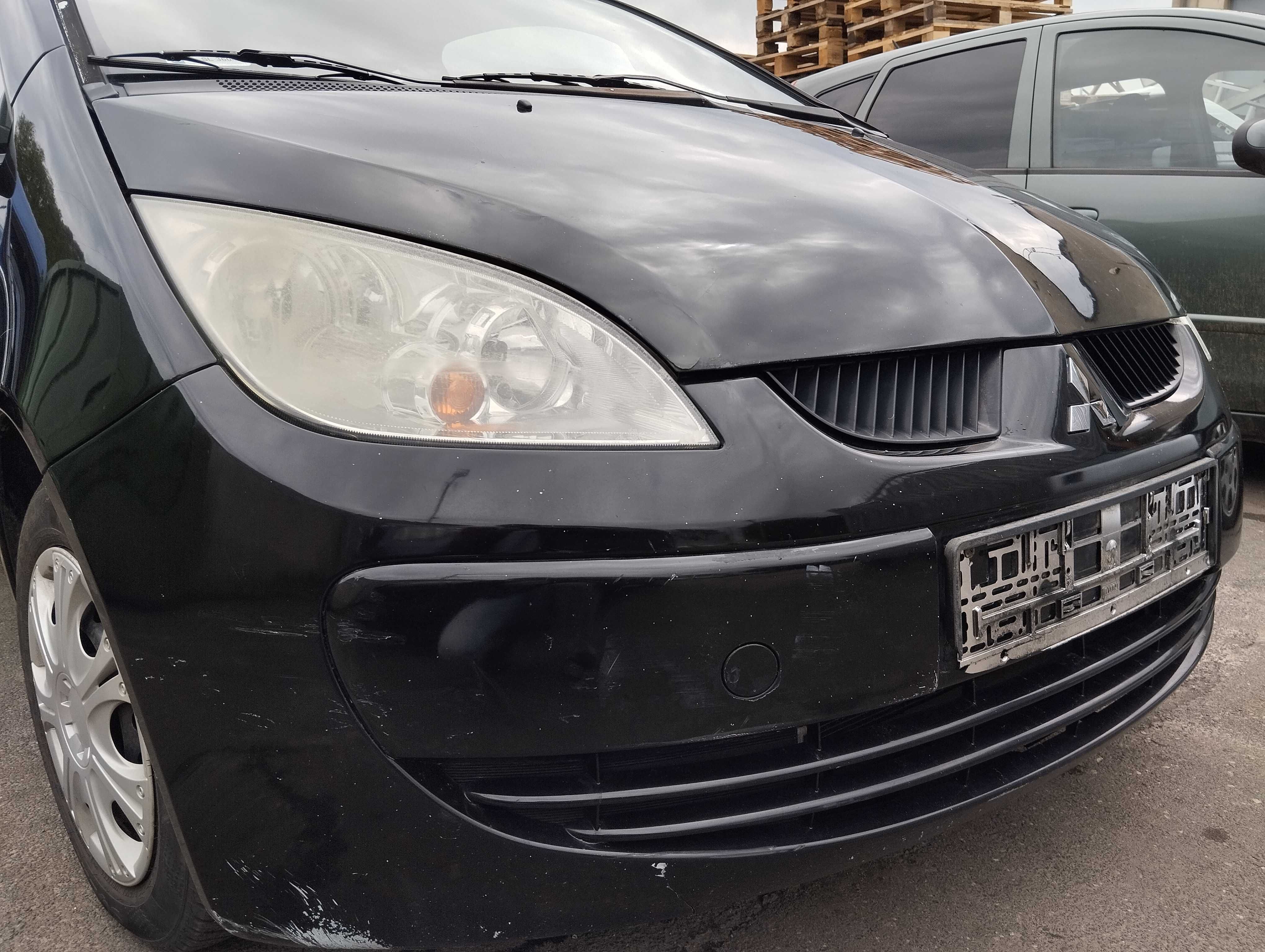 Mitsubishi Colt CZ3 1.3i 3D 2005r.Zderzak przedni.01D
