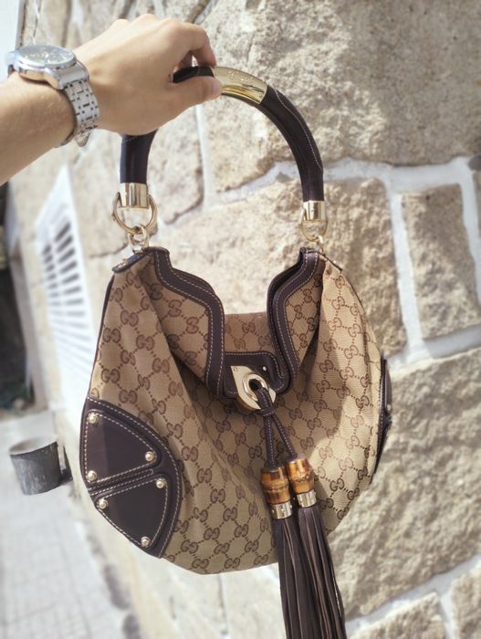 Gucci Bolsa GG Canvas Mini Babouska Indy