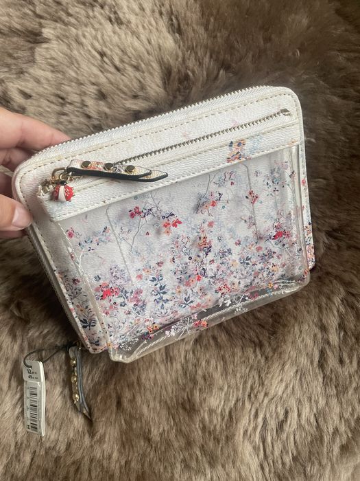 Cobertura agenda com fecho e bolsa extra exterior da Parfois, nova