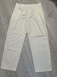 Білі брюки Zara