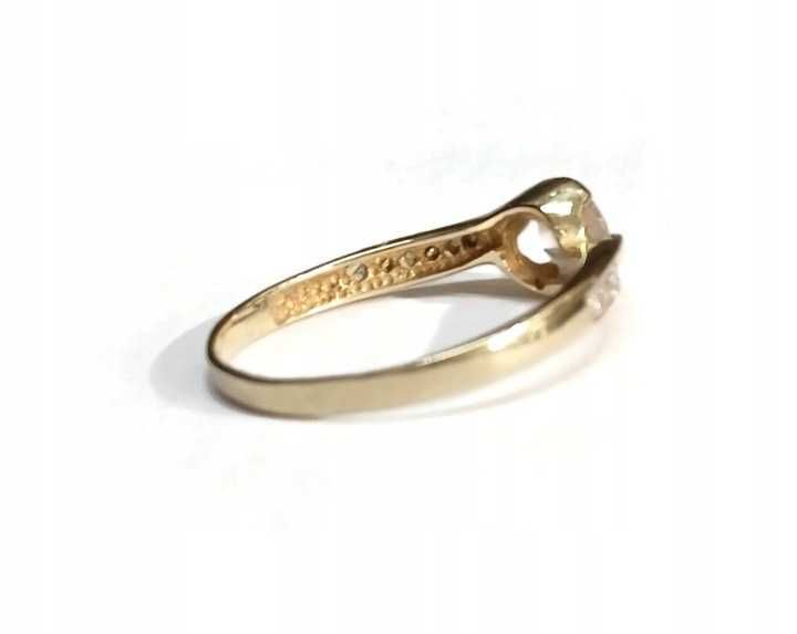 Złoty pierścionek z cyrkoniami 585/2,80 g r.23