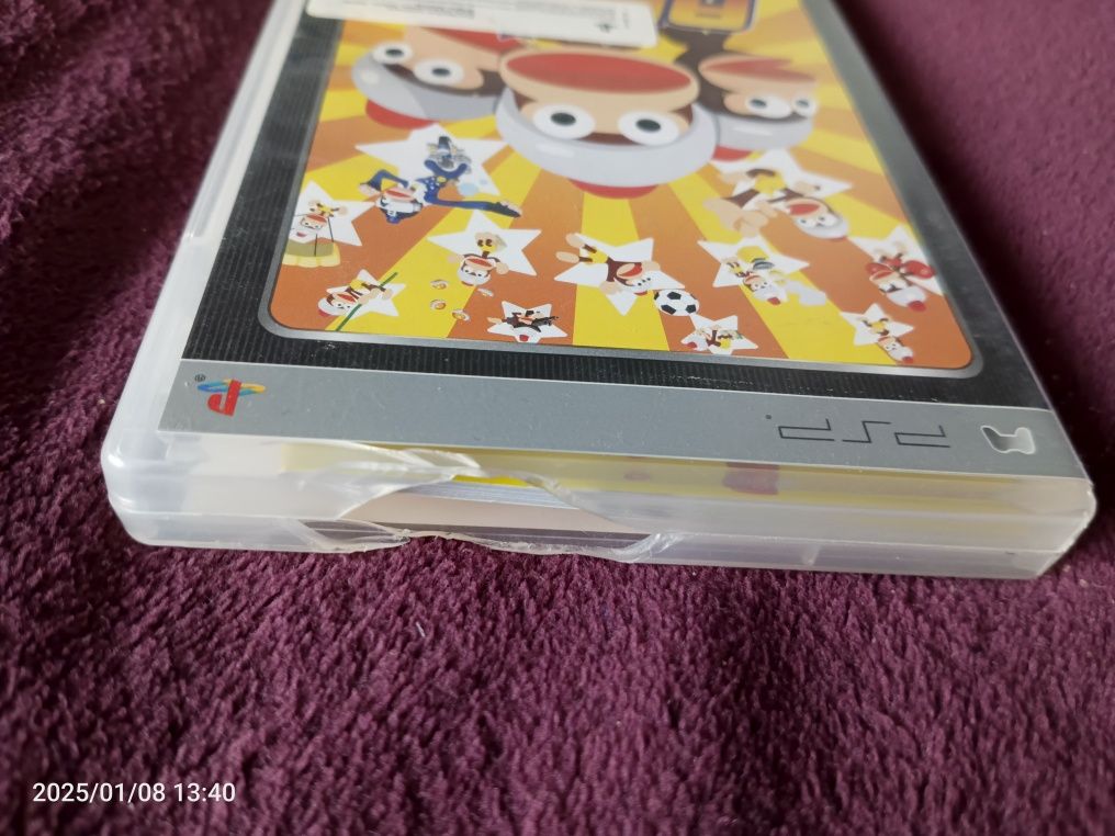 Pudełko od gry Ape Academy na konsolę PSP