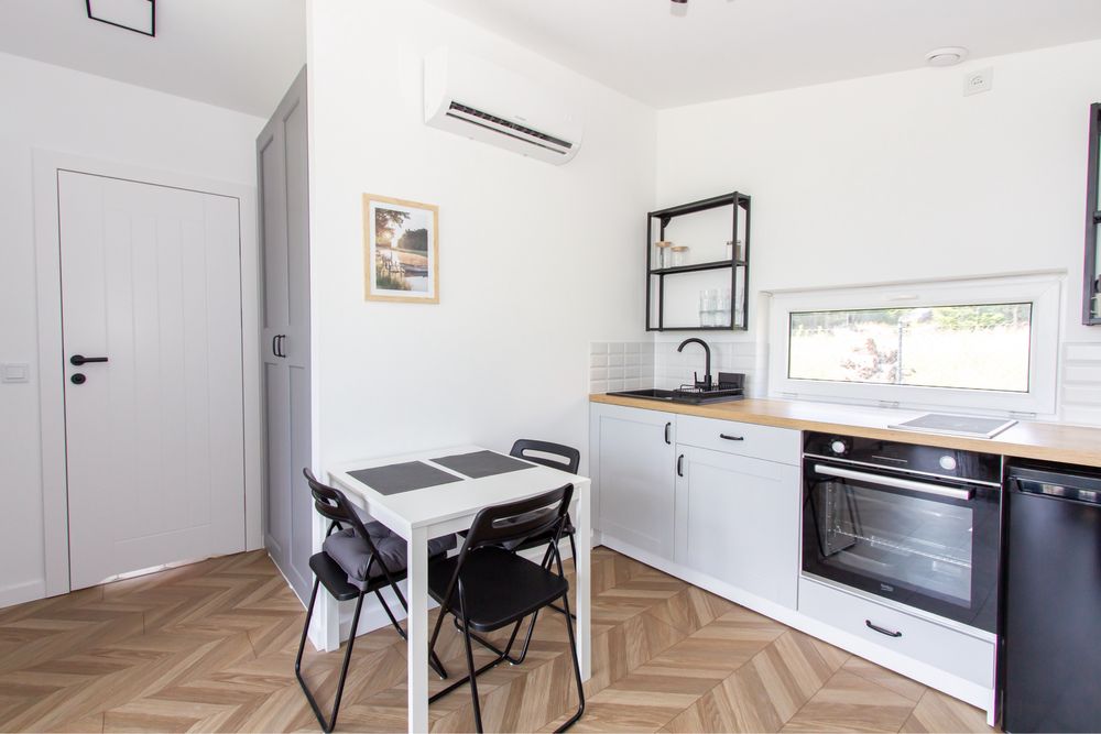 Domek letniskowy z widokiem na jezioro Spore