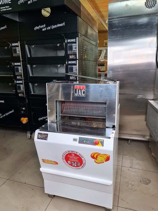 Хлеборезка хлiба и сухарикiв Хліборізка JAC Neu из Германии автомат
