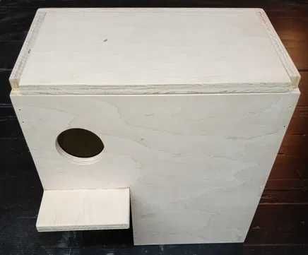 Budka lęgowa dla amadyna.