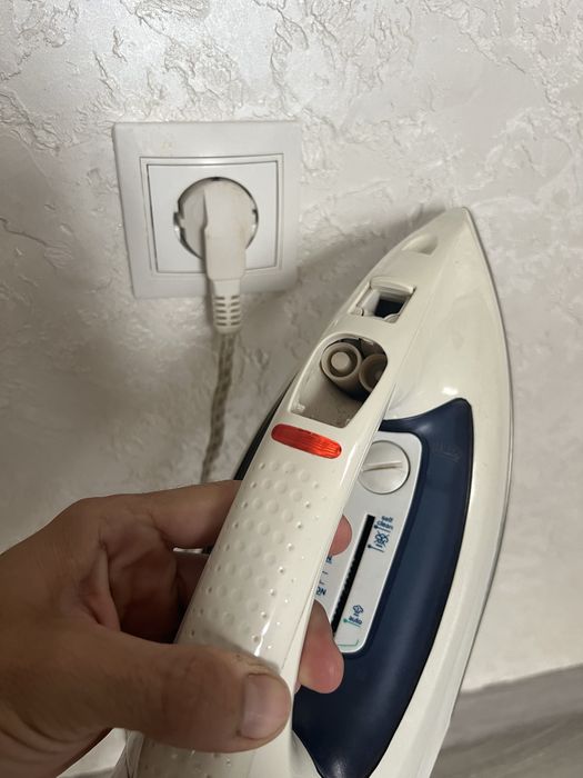 Праска утюг Німеччина