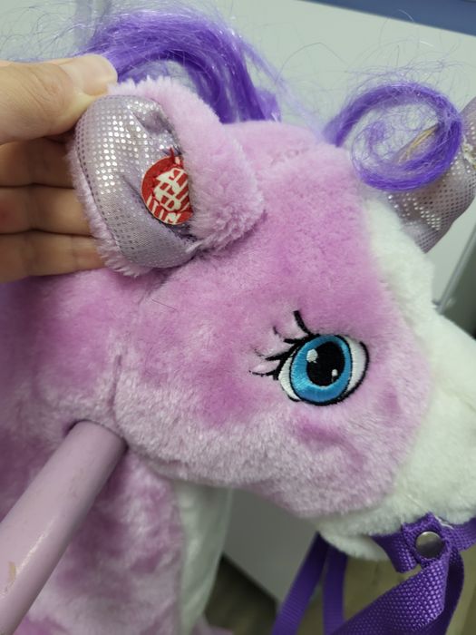 Коник гойдалка фіолетового кольору