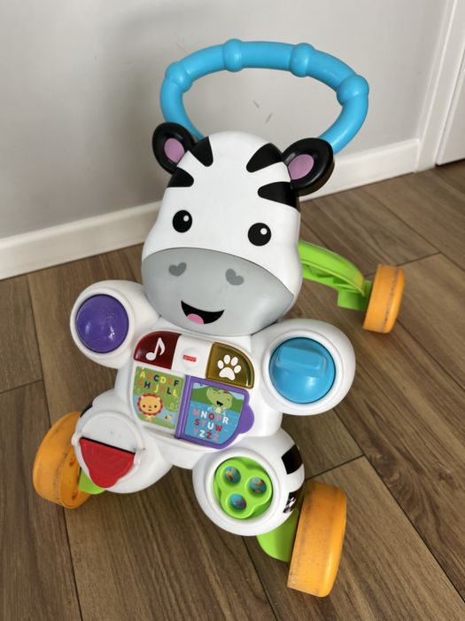 Fisher price interaktywny pchacz