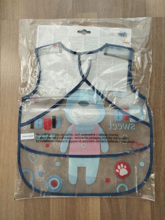 Nowy Śliniak Canpol plastikowy z tygryskiem