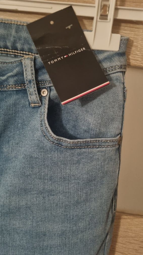 Spodnie jeansy Th niebieskie jasny Tommy r. 38 S, M