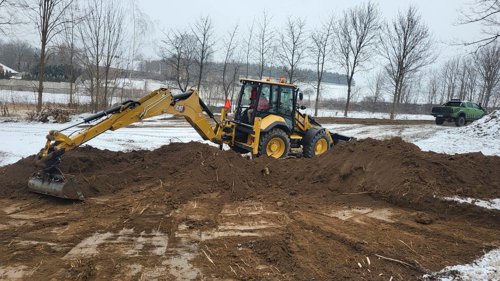 Usługi koparko-ładowarką CAT 444 – wszystkie prace ziemne,wyburzenia