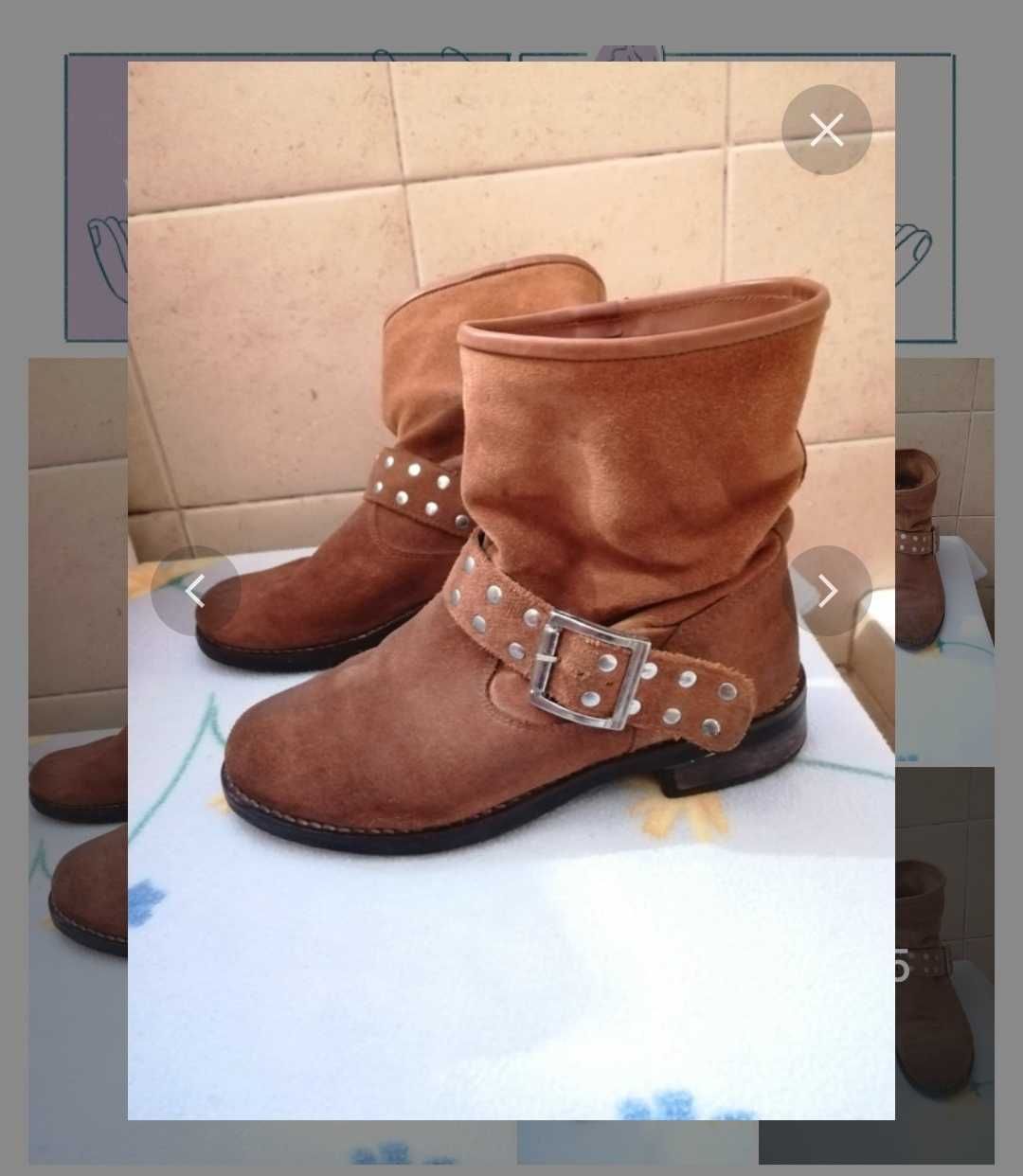 Botas em pele castanha