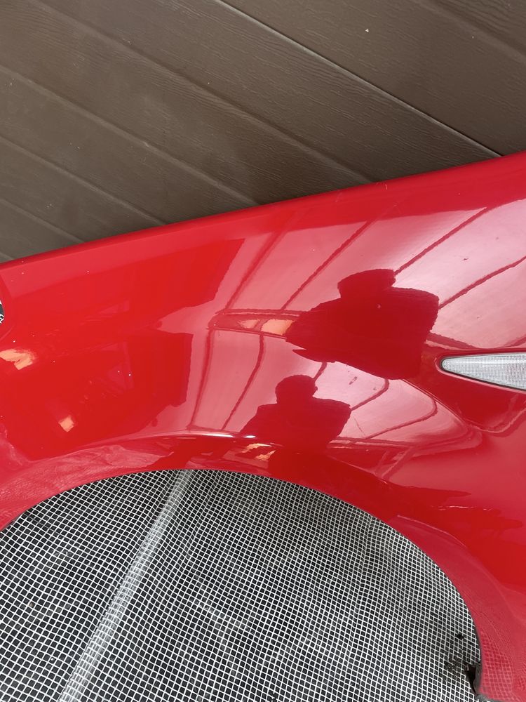 BŁOTNIK lewy przód Dacia Sandero 1  I 08-12r czerwony DV21D wysyłka