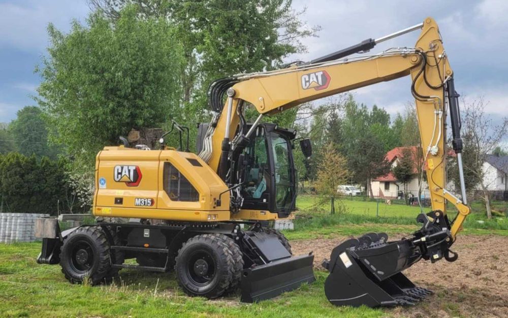 Usługi – Wynajem koparki kołowej z systemem 3D wraz z operatorem