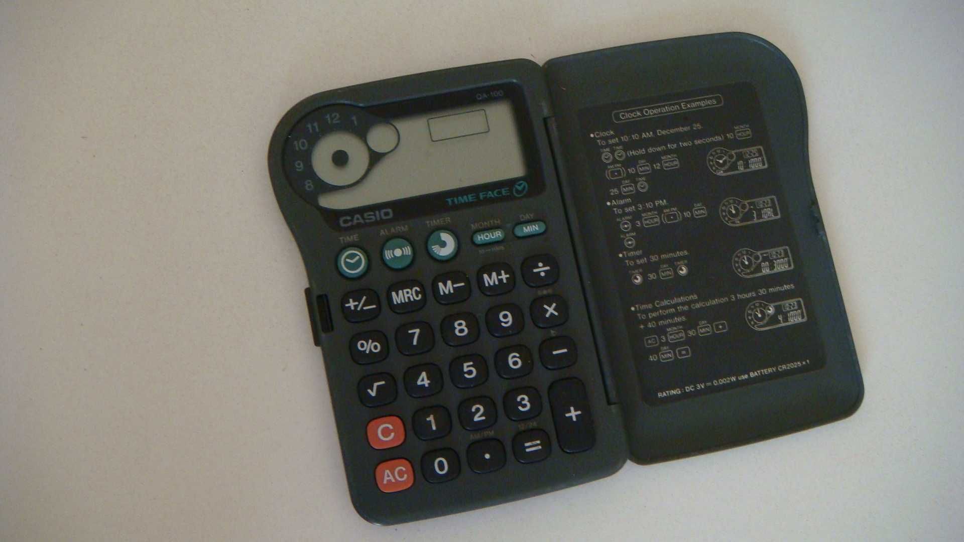Винтажный складной калькулятор CASIO Time Face QA-100 касио