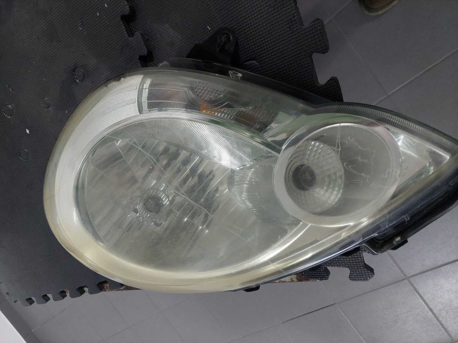 farol esq Renault kangoo
