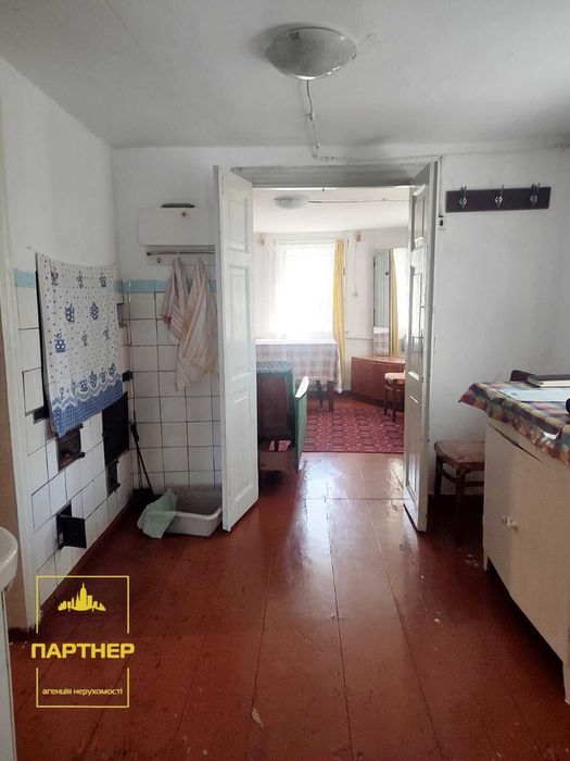 Продам  окрему  частину   будинку  у  нагірній частині Кременчука