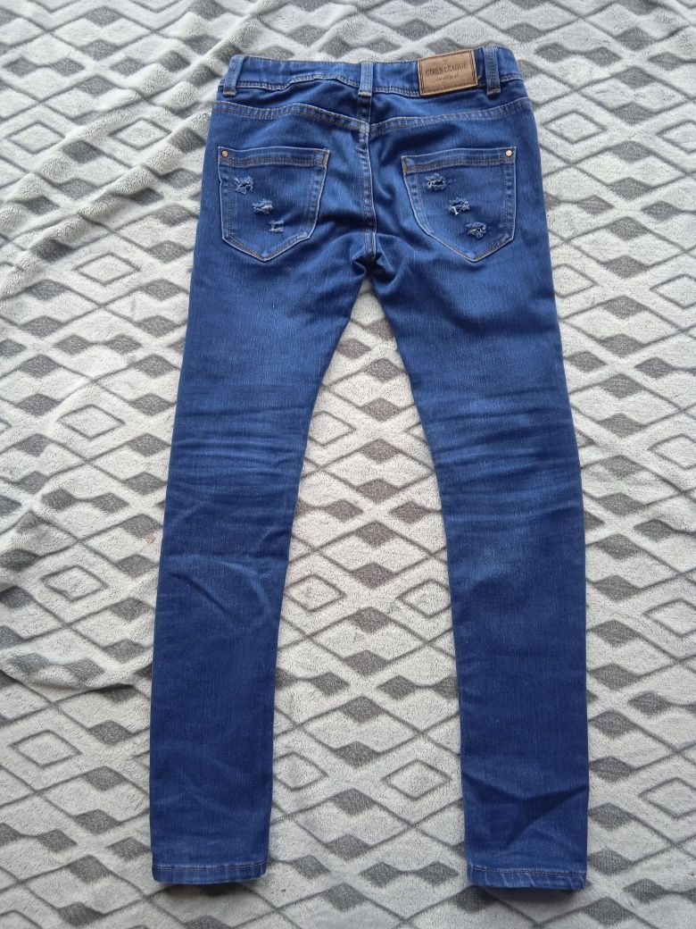 Modne jeansy dla dziewczynki skiny rurki dziury rozm. 140