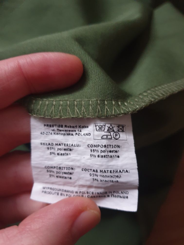 Dopasowana sukienka, zakładki, rozcięcie S Prestige Robert Kotas