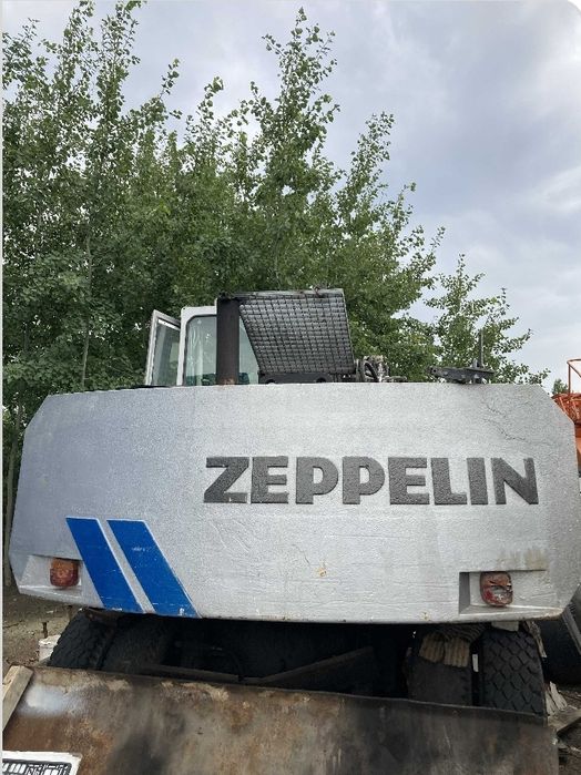 Послуги колісного екскаватора .