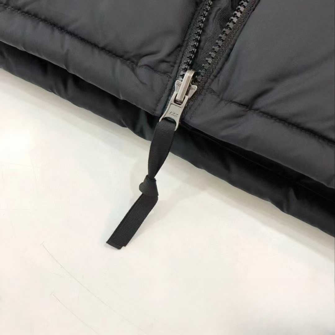 Stylowe puchowe kurtki The North Face dla par. rozmiar: L