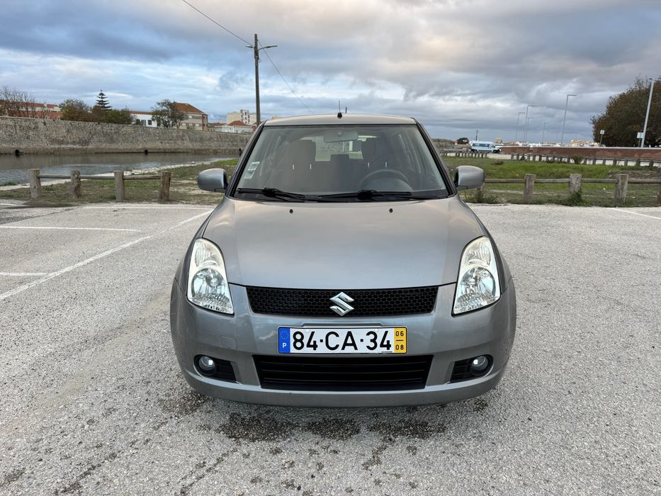 Suzuki Swift 2006 Automatico poucos kms 4.8 l/100 mto economico