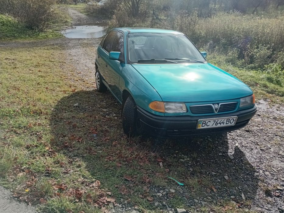 Опель астрп ф 1,6 газ бензин