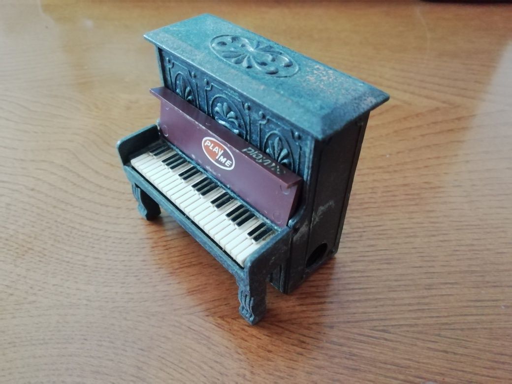 Afia lápis vintage, em ferro: piano musical