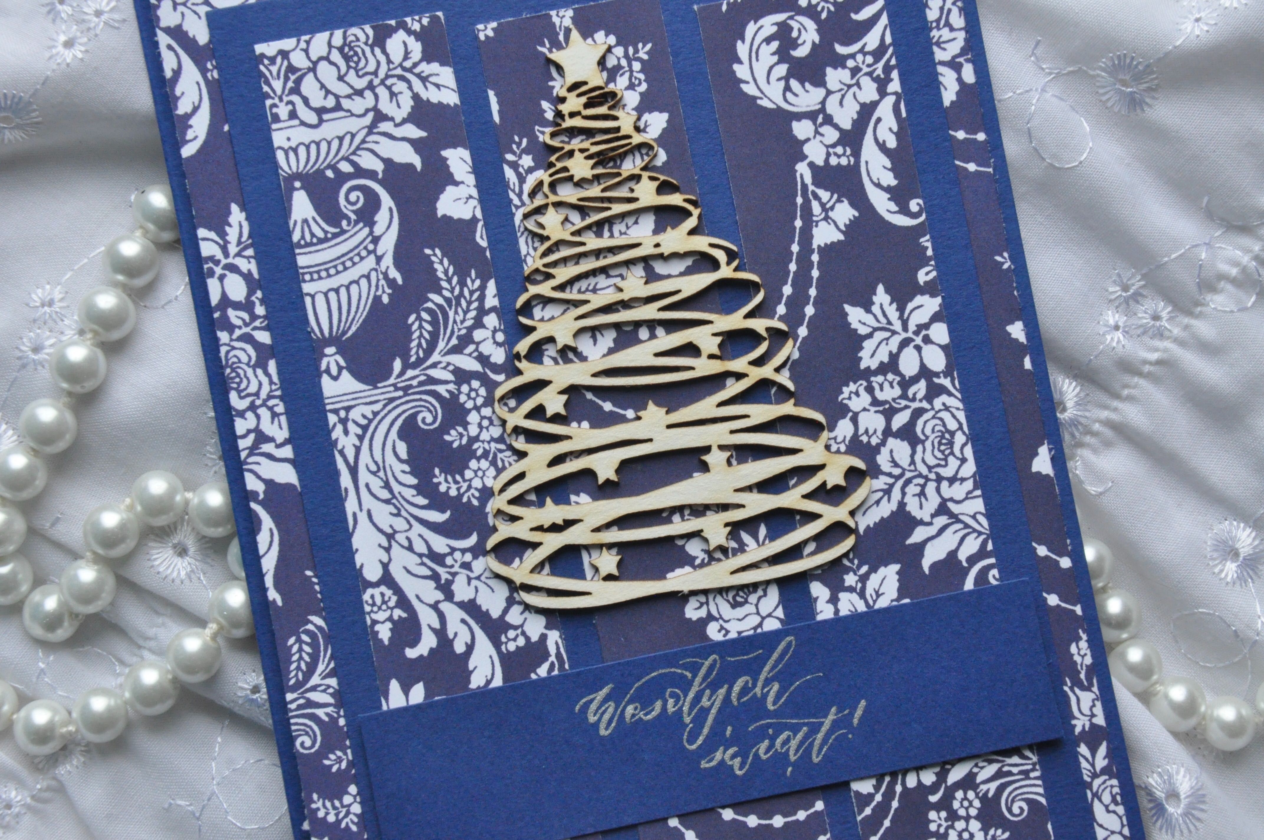 niebieska elegancka ręcznie robiona kartka świąteczna choinka