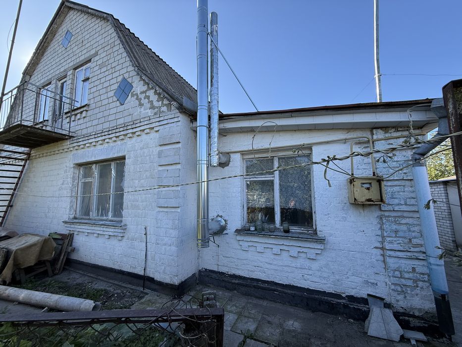 Продаж цегляного півбудинку в р-ні 6 школи