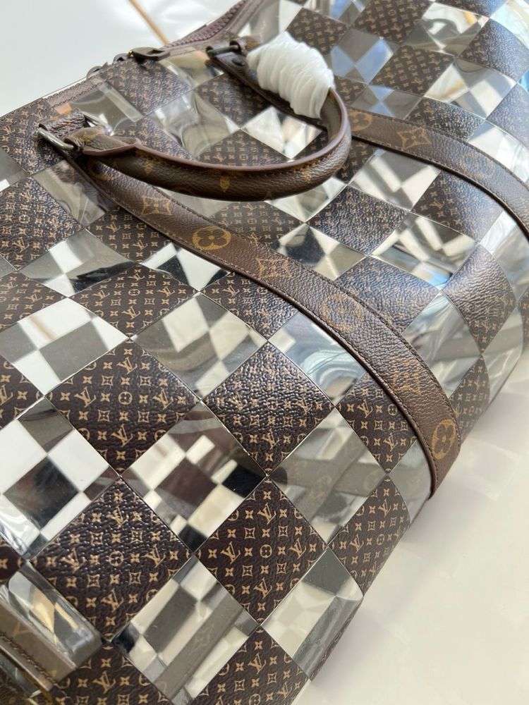 Saco de viagem Louis Vuitton  Lona e acrilico
