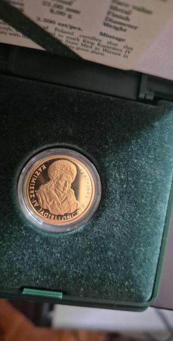 Złota moneta 100 zł.