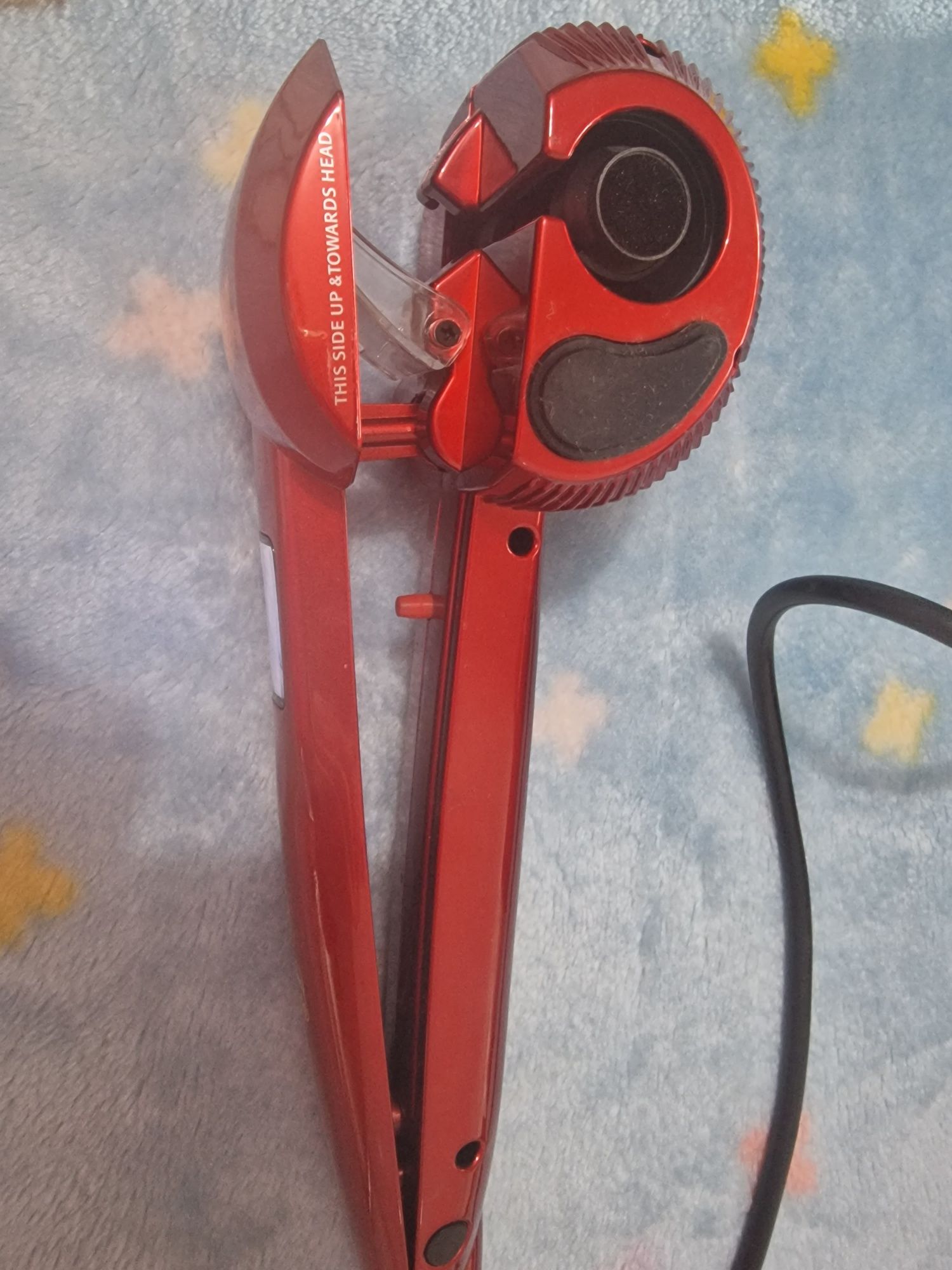Modelador de cabelo automático
