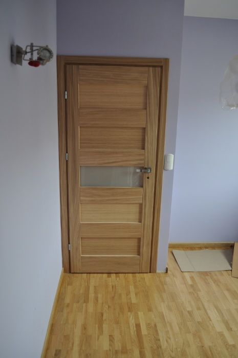 Drzwi wewnętrzne drewniane z montażem  nw2 obłóg dębowy