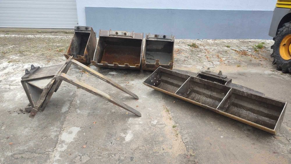 Koparko-ładowarka Mecalac 12MTX. Rok produkcji 2012. Komplet łyżek