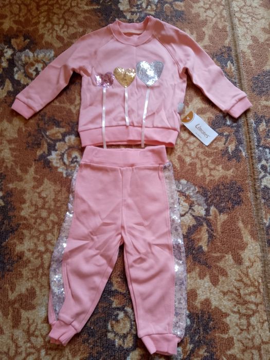 Продам новий костюм і плаття для дівчинки