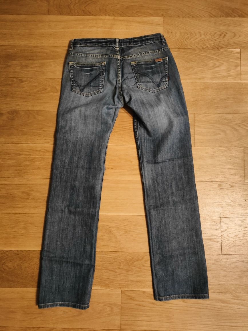 Spodnie damskie jeans Springfield