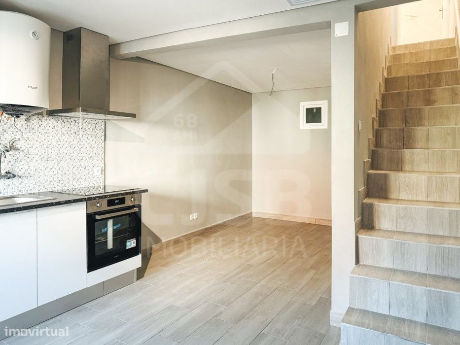 Moradia em Banda Benavente