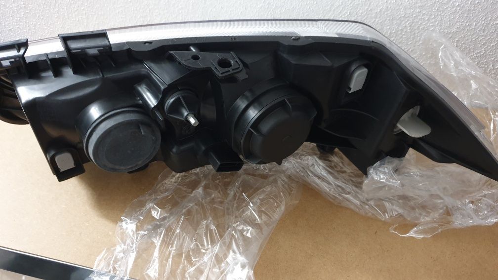 Farol direito Renault Megane II 03-05