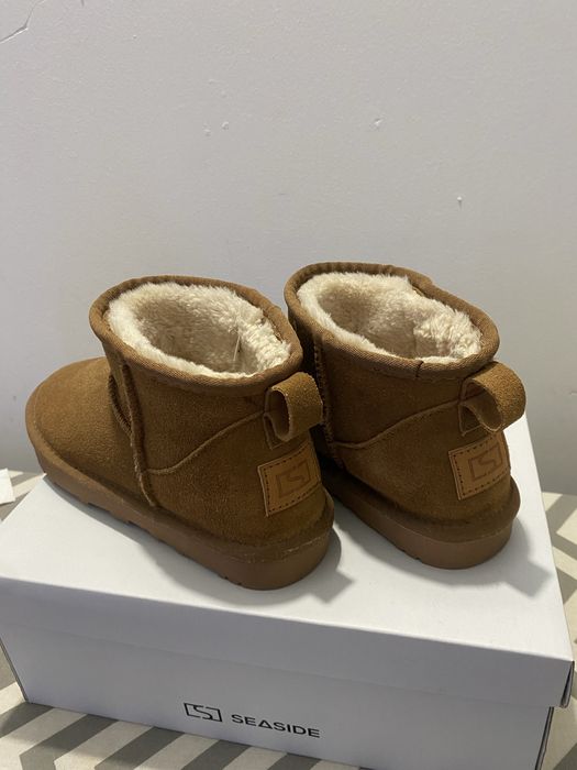 Bota castanha de pelo