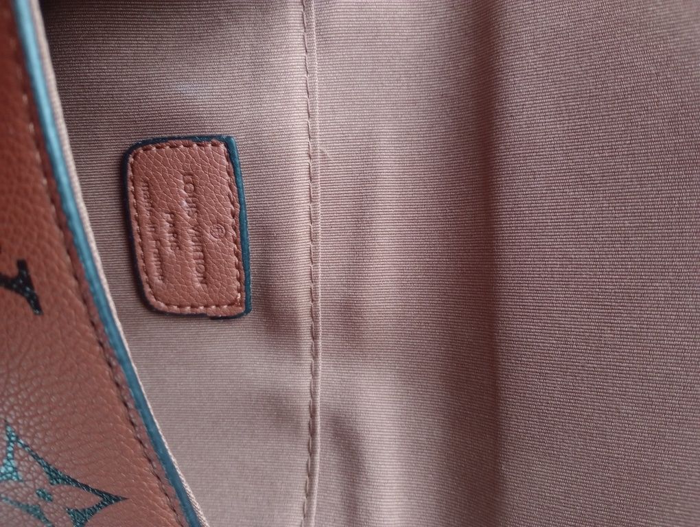 Skórzana kopertówka oryginalna Louis Vuitton