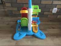 Ścianka Fisher Price, interaktywna zjeżdżalnia klocków