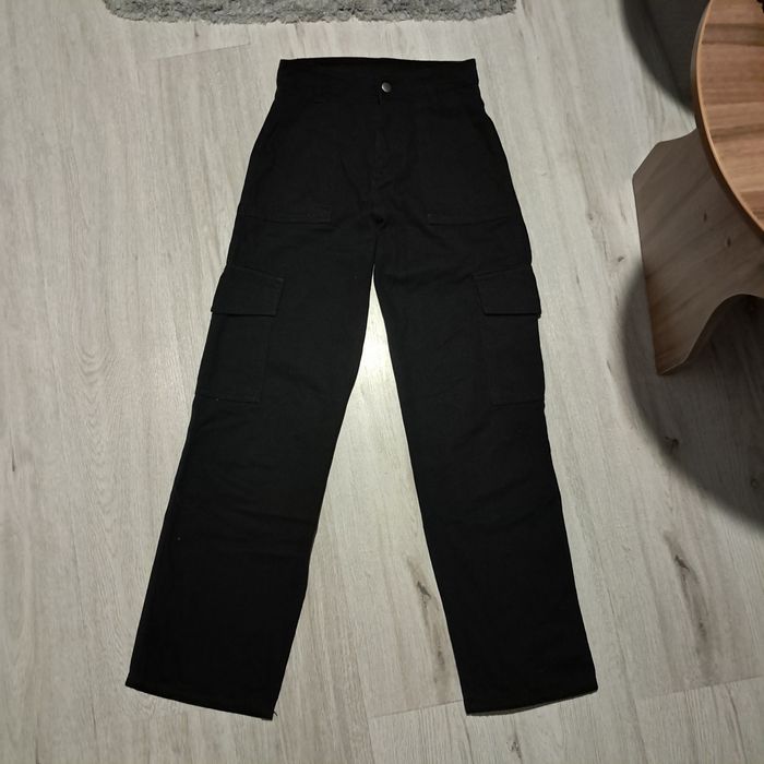 Damskie jeansy czarne z wysokim stanem i z sześcioma kieszeniami