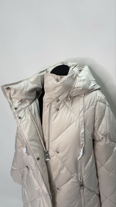 Жіночий подовжений пуховик CLASNA 46,52 полномерный